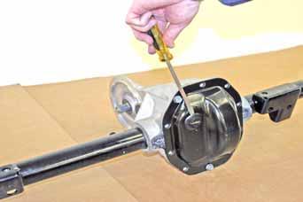 Installation of the limited slip gear can be done with axle out of car or with car lifted to gain access from underneath. Refer to repair manual for proper lifting instructions if car is to be lifted.