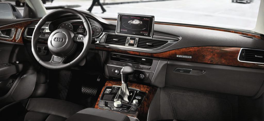 immerse The interior is a perfect fusion of technology and luxury. Sweeping wood inlays and brushed aluminum details on bezels and controls complement the rich leather interior.