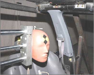 An OEM left front seat was utilized with its associated seat mounted side airbag for the testing. The side airbag was manually and continually inflated with a residual pressure of approximately 0.