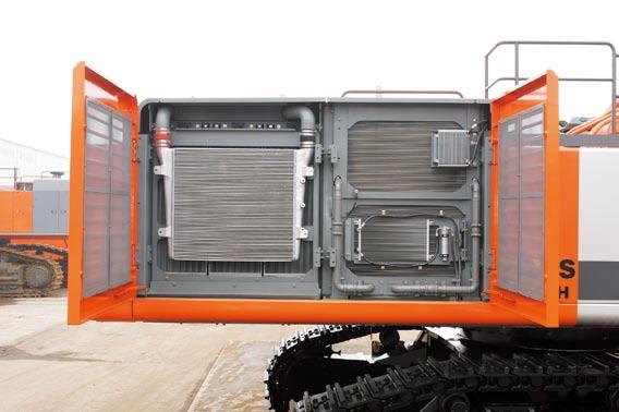 The air-conditioner condenser and fuel cooler can be opened to easily clean them and the radiator located behind.