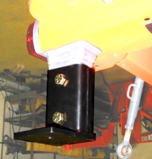 If tractor is equipped with front end loader, de-tach quik-tach loader and then unbolt hyrdaulic valve mounting plate from loader mast support column.