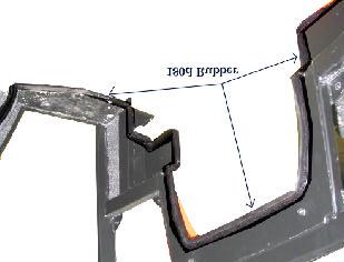 Attach a chain or lifting strap to the lift brackets and prepare to hoist cab off of shipping pallet. Unbolt the shipping bracket and lift cab off of pallet. Figure 6 6. Take the underseat shield.