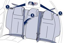 Position the seat belts on the backrest and buckle them. Place the head restraints in the low position.