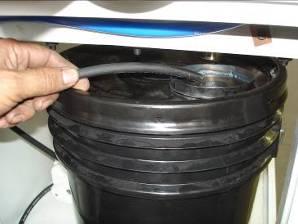 pail; make sure the tubing is fully