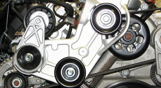 Install the supplied serpentine belt tensioner onto the tensioner bracket using a 15mm socket, the M10 x 45mm bolt supplied in Bag #2 and