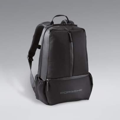 Luggage [ 1 ] Sports backpack. Main compartment with opening for headphone cable. Water-repellent outer zippers. Ergonomic backboard with air-circulation system. Made of durable polyester/nylon.