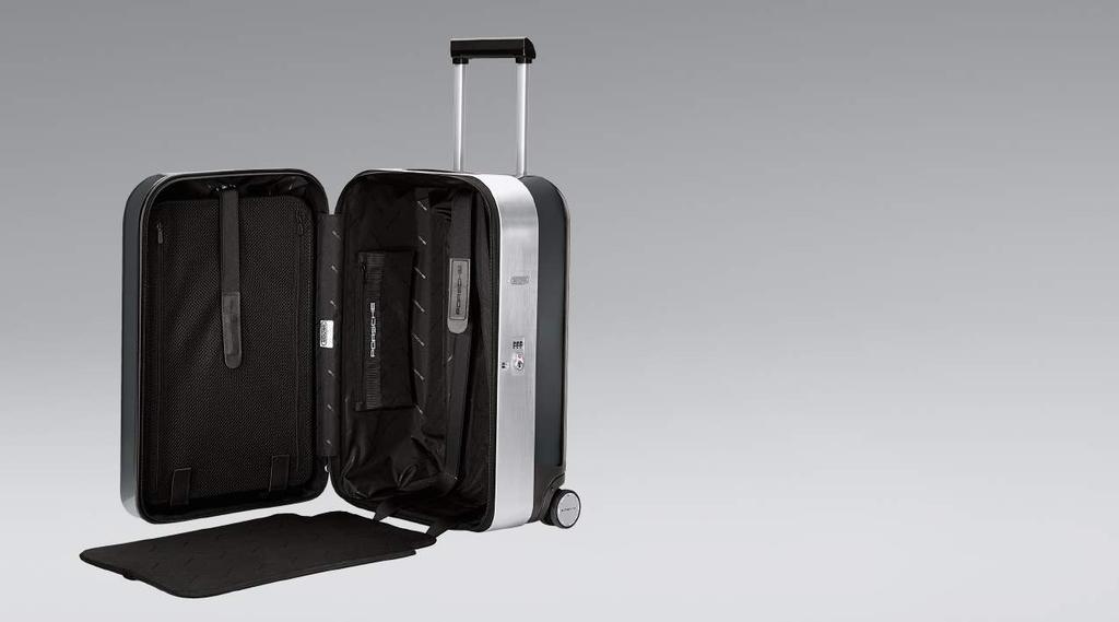 Luggage Twin-tube aluminum telescopic handle, can be extended twice Hand-brushed aluminum Two side zipper pockets TSA-approved lock Black lining, can be wiped clean Water-repellent all-around zipper