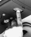 Now, with the compartment door closed, press the button again to make sure the garage door opener operates properly.