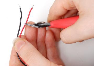 Cut the red wire of the battery pack short by about an inch.