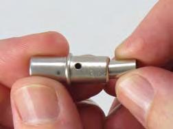 pressure to the small diameter end of the sealing plug.