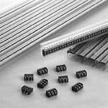 The products have through-hole leads that penetrate the holes in the solder pads in the PCB.
