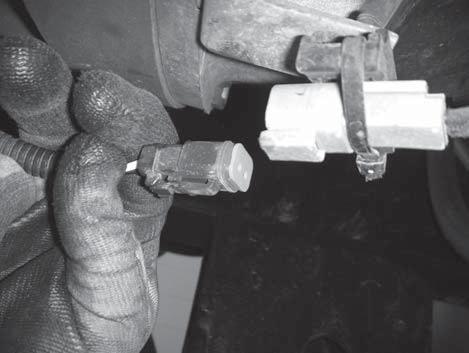 Apply included material to low voltage 4-pin harness connector terminals.