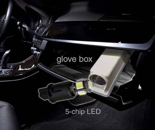Glove Box Using a trim removal tool, pry the white plastic glove box light fixture from the glove box liner.