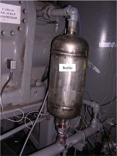 Based on the analysis, a volume bottle was installed in the lube oil line near the compressor oil port (Figure 25). Figure 25.