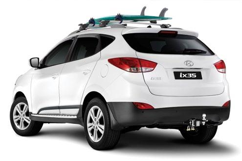 The Hyundai ix35 Series II Active model featured above in Pure White is accessorised with Hyundai Genuine Whispbar Quiet Roof Racks 4, Surfboard Carrier, Front Park Assist 5, Bonnet Protector,
