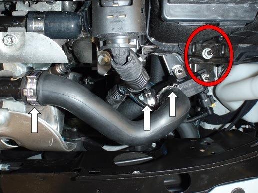 5. Remove the three clips arrowed below that connect the stock valve to the engine.
