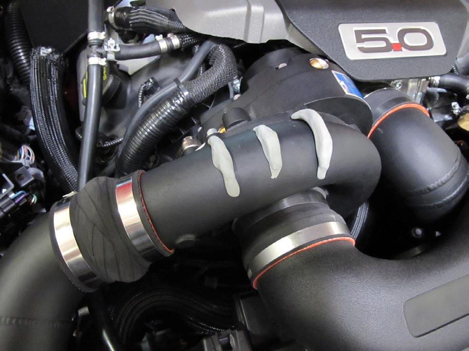 The V-7 / Novi 2200 systems have a larger supercharger volute, which may also interfere with the OEM hood.