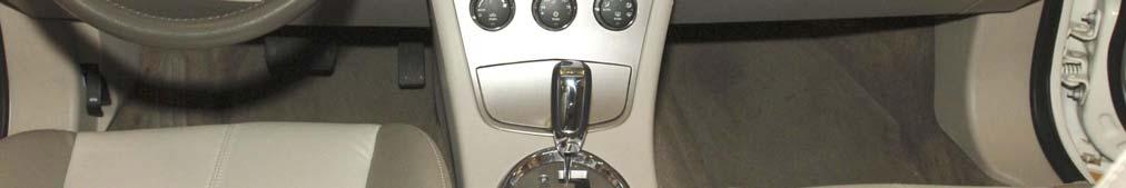 Pull up on the shifter knob and remove it from the shifter lever (Figure 1). 4.