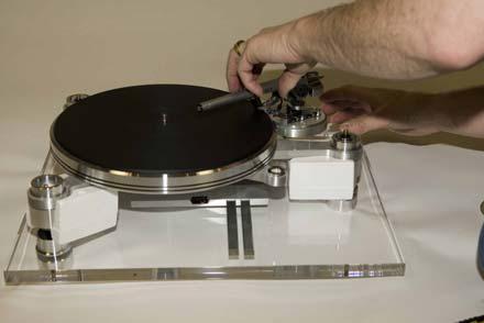 INSTALL THE TONE ARM AND PHONO CARTRIDGE Precaution When performing anything near the tonearm and cartridge, please do not wear loose clothing, ties, sweaters or anything than can catch or damage the