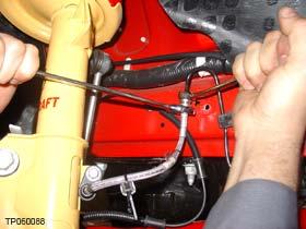 10. Tighten the brake hose to the brake hard line on the frame rail, making sure you use a backup wrench (see Figure 6) and that there is proper thread