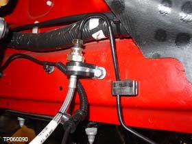 13. Secure the brake hose/hard line to the vehicle frame rail with the provided rubber padded support clamp and 16mm long bolt (see Figures 4 & 8). 14.