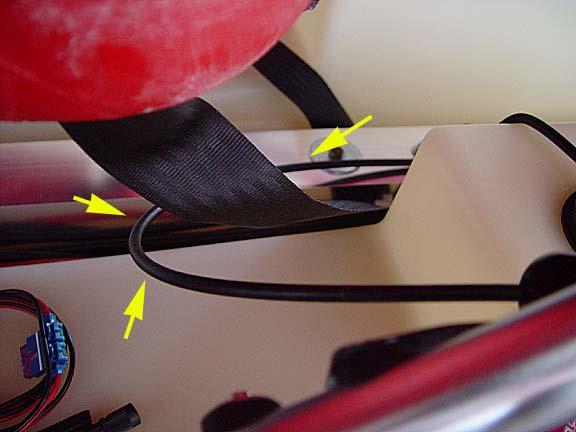 Follow yellow arrows to see the location of the seat belt and Activation Housing. 5.