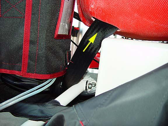 5 Slide left side of the rear seat belt through the slot in fiberglass seats. 5.