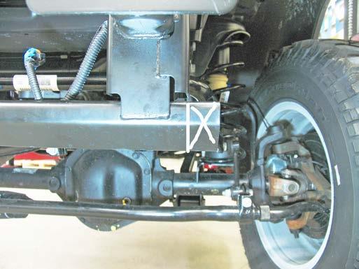 edge of the lower side bracket. Do this to both sides of the vehicle.
