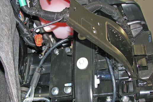 Flush the top of the plate with the frame and tighten all hardware. Do this on both sides of the vehicle. 10.