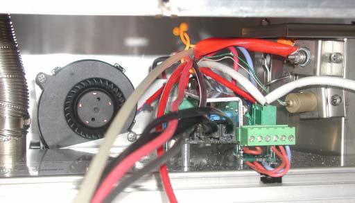 Figure 12: Tie up the fuel line, cooling fan cable and power cable with a clip to the other cables of the control unit.