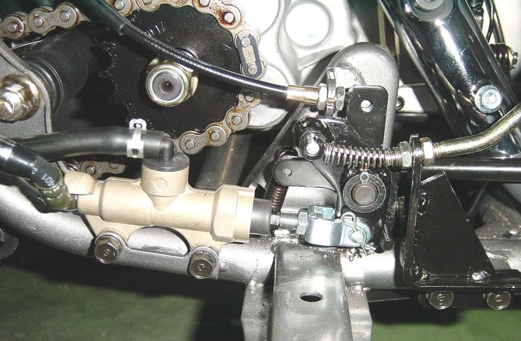 The cable connects to wire connector for front brake function.