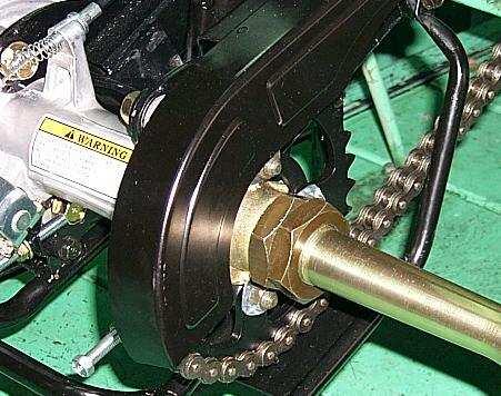 Assemble the drive chains on the driven sprock- et.