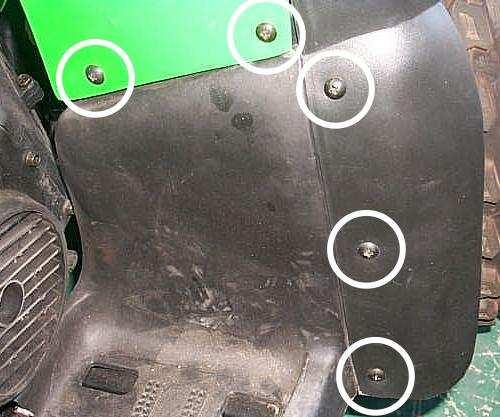 Remove the mounting bolts and nuts from the front fender and footrest plate. 10.