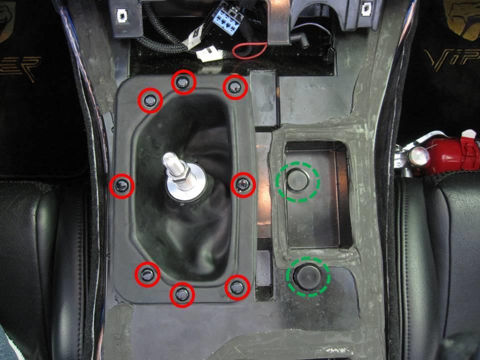 Attach the lower shift boot using the supplied push-in nylon rivets (supplied) Position the boot opening around the isolator of the OE shift shaft (in this case, the lower shift boot 1 lowering kit