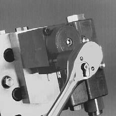 Remove the solenoid and the solenoid adapter plate from the multi-function block.