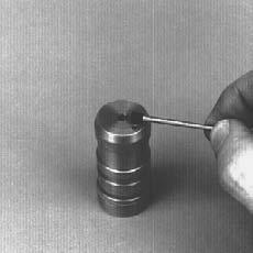 (An 8 mm threaded hole is provided in the plug for a puller screw.) Remove the O-ring from the plug. A single servo drain orifice is installed in the valve sleeve bore plug.