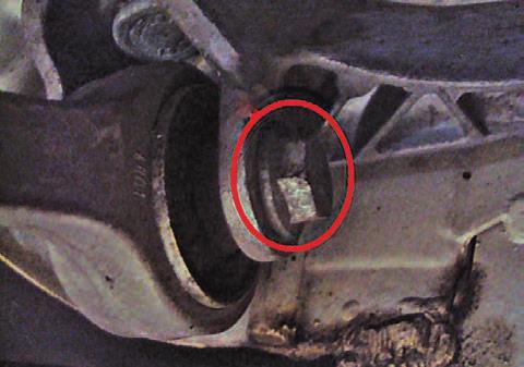 If the upper control arm bolt heads face toward the outside of the bracket remove the bolts and