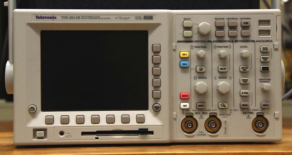 Voltmeters and Signal Processors Tektronix TDS 3012B Digital Oscilloscope voltmeter and signal processor for high-speed measurements output screen with signal waveform