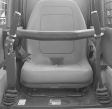Operator s Seat The seat is mounted on rails for backward or forward repositioning. A spring-loaded latch handle activates the seat adjustment mechanism.