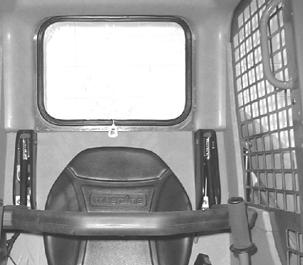 Rear Window Emergency Exit The ROPS rear window has three functions: noise reduction, flying objects barrier and emergency exit.