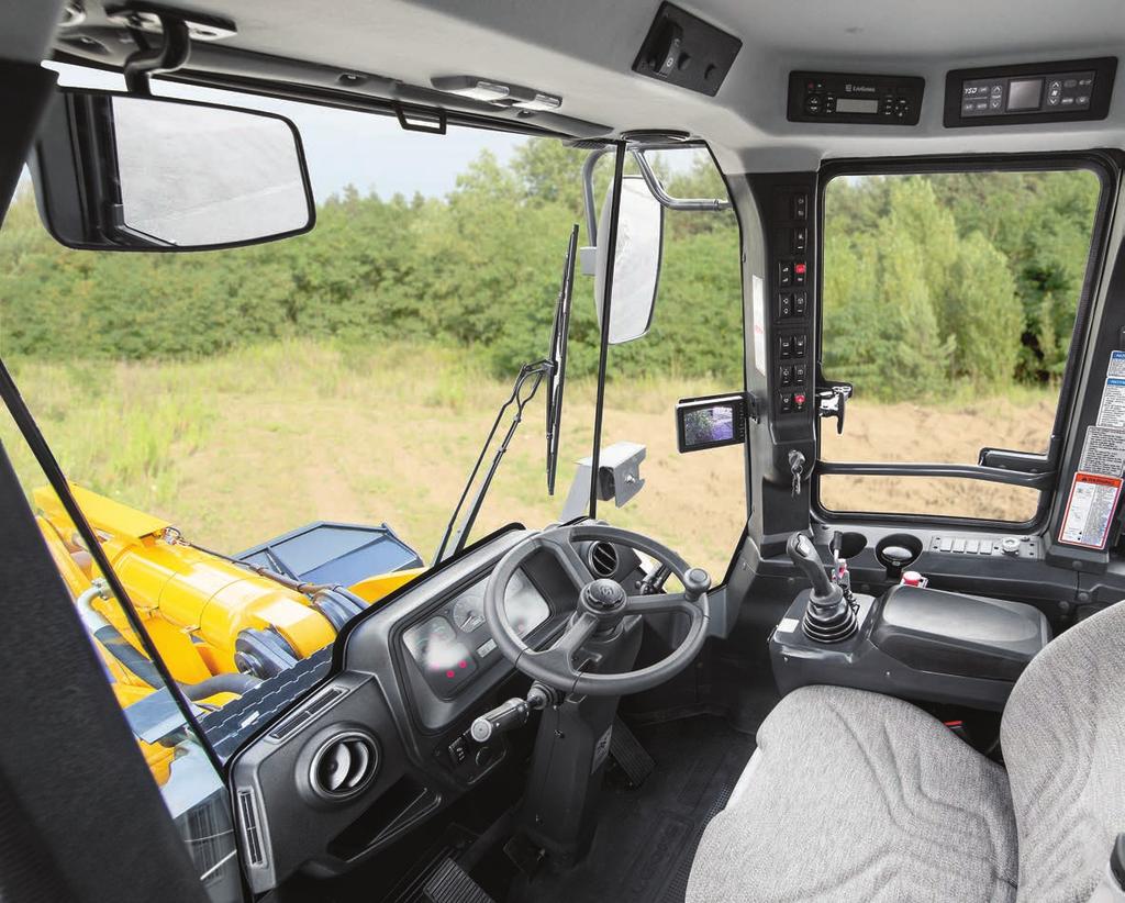 856H WHEEL LOADER AN ENVIRONMENT DESIGNED FOR WORK Ergonomically designed controls, a roomy cab, clear visibility and convenient features all contribute to operator comfort and overall productivity