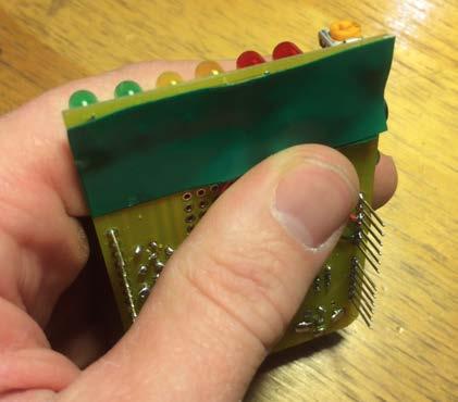 Install chips in chip holders, with circle mark on chip towards the RCA input.