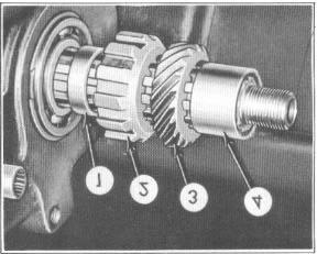 . 2. Turn the governor (2), Figure 38, so that the end of the fork is out of the notch of the direct drive rocker arm retaining plate; then pull the valve out of the sleeve.