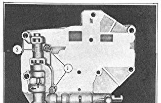 46 AUTOMATIC TRANSMISSION 7. Place the converter control valve body gasket (3) in position on the base plate (4), Figure 64. 8.