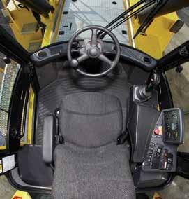 ERGONOMICS OUTSTANDING ALL-AROUND VISIBILITY CAB FEATURES A full-suspension, fully adjustable driver s seat with a seat belt, operator presence
