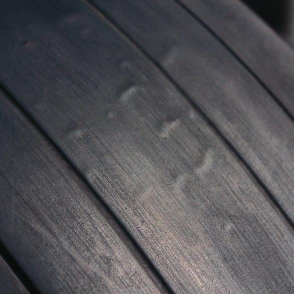 BULGE ON THE CROWN SUR- FACE (DEFLATED TIRE) Severe operating conditions may cause local reinforcing fabric nylon cord to rupture. When such tires are deflated, small bulges (i.e. surface swelling) may appear on the tread surface.