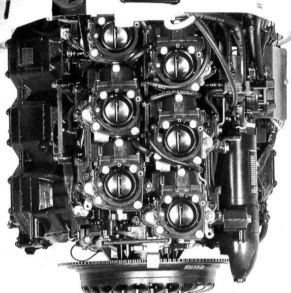 Flywheel Starter Carburetors Manifold Pump The business end of a 3 litre,