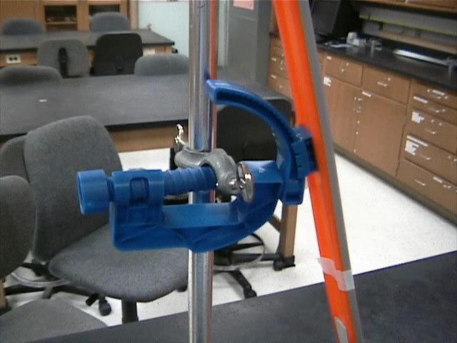 For convenience we will refer to the section of track between the Hot Wheels TM clamp and the table top as the Start Ramp and the section of track between the tabletop and the moveable ring
