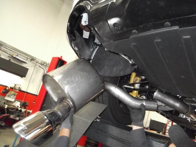Borla Performance Cat-Back Exhaust System Installation 1. Orient components on floor referencing page-2 drawing. 2.
