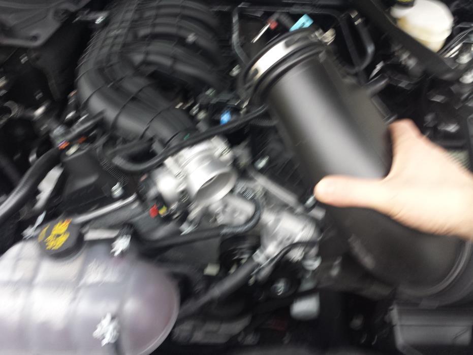 Remove the clamp on throttle body end of the